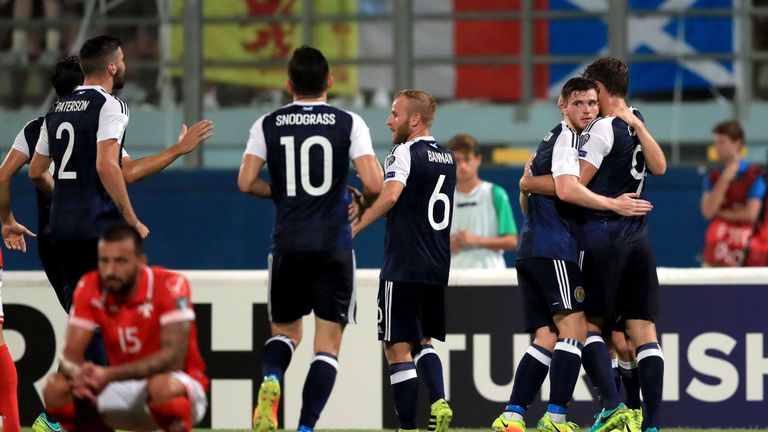 Scotland's Chris Martin (right) celebrates scoring his side's second goal 