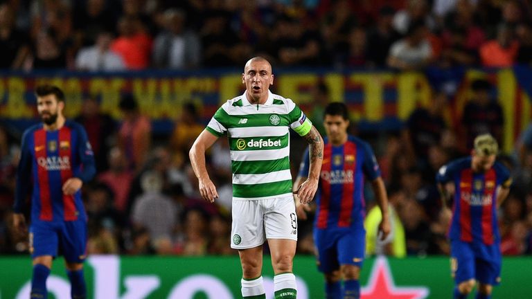 Scott Brown of Celtic looks dejected during the 7-0 defeat at Barcelona
