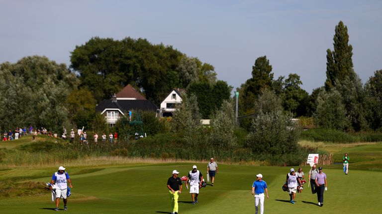 SPIJK, NETHERLANDS - SEPTEMBER 10:  Scott Hend of Australia, David Horsey of England and Ben Evans of England walk on the 3rd during the third round on day