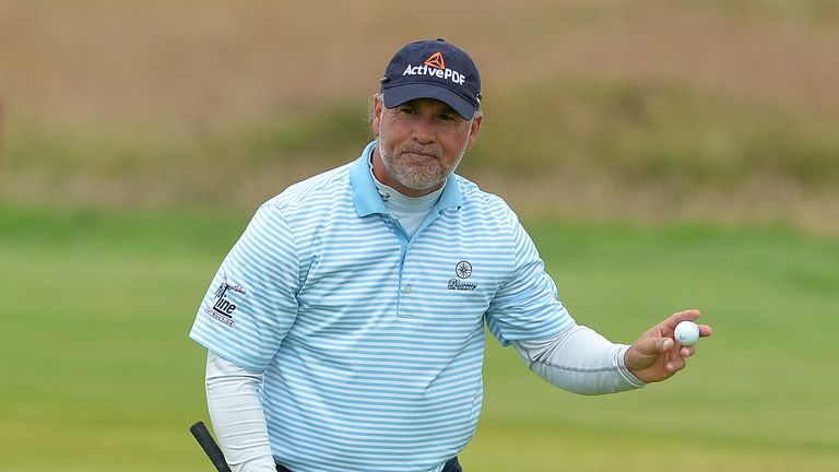 CARNOUSTIE, SCOTLAND - JULY 23: Scott McCarron of United States reacts after holing a putt at the 14th green during the third day of The Senior Open Champi