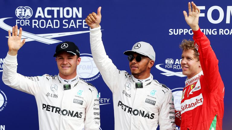MONZA, ITALY - SEPTEMBER 03: Top three qualifiers, Lewis Hamilton of Great Britain and Mercedes GP, Nico Raosberg of Germany and Mercedes and Sebastian Vet