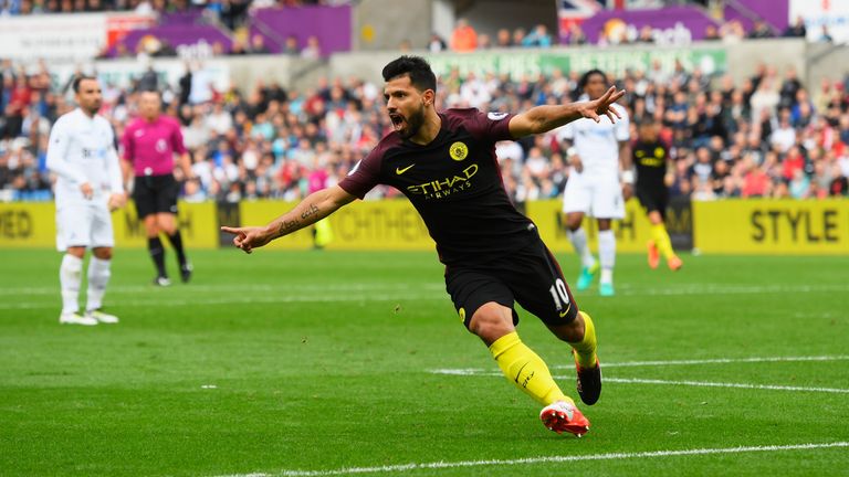 SWANSEA, WALES - SEPTEMBER 24: Sergio Aguero of Manchester City celebrates scoring his sides first goal  during the Premier League match between Swansea Ci
