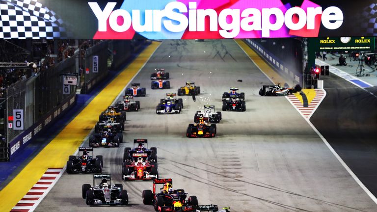 SINGAPORE - SEPTEMBER 18:  Nico Rosberg of Germany driving the (6) Mercedes AMG Petronas F1 Team Mercedes F1 WO7 Mercedes PU106C Hybrid turbo leads Daniel 