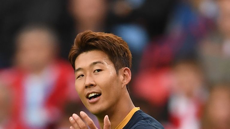 Heung-Min Son of Tottenham Hotspur celebrates scoring his side's second goal during the Premier League match at Stoke