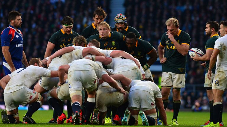 South Africa's hooker Adriaan Strauss looks up before a scrum during a Test match between England and South Africa at Twickenham