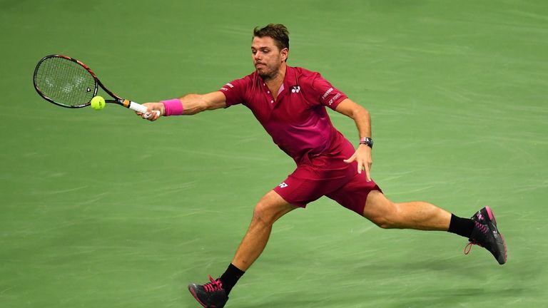 NEW YORK, NY - SEPTEMBER 09:  Stan Wawrinka of Switzerland returns a shot to Kei Nishikori of Japan during their Men's Singles Semifinal Match on Day Twelv
