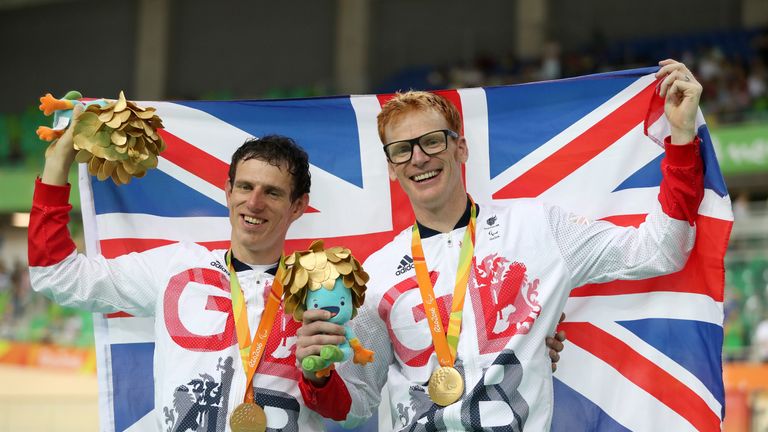 Great Britain's Steve Bate (right) and pilot Adam Duggleby celebrate on the podium after winning gold in the Men's B 4000m Individual Pursuit Final at the 