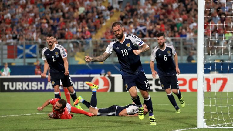 Scotland's Steven Fletcher celebrates scoring his side's fourth goal 