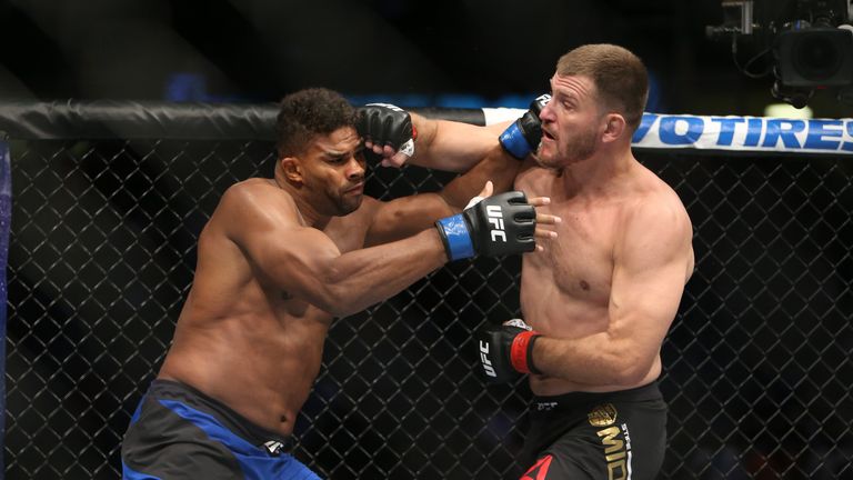 CLEVELAND, OH - SEPTEMBER 10: Stipe Miocic punches Alistair Overeem during the UFC 203 event at Quicken Loans Arena on September 10, 2016 in Cleveland, Ohi