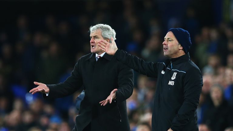 Mark Hughes, manager of Stoke City, and assistant Mark Bowen