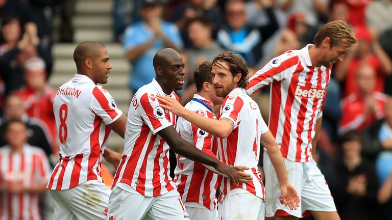 Stoke City's Joe Allen (centre right) celebrates scoring his sides first goal of the game during the Premier League match at The Bet365 Stadium, Stoke-on-T