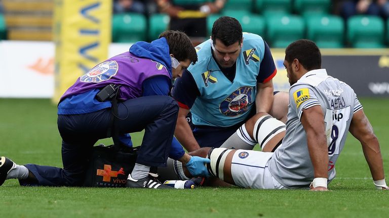 Taulupe Faletau of Bath receives attention before being replaced during the Aviva Premiership match between Northampton and Bath