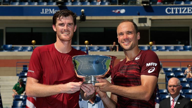 Jamie Murray of Great Britain and Bruno Soares of Brazil celebrate with the trophy