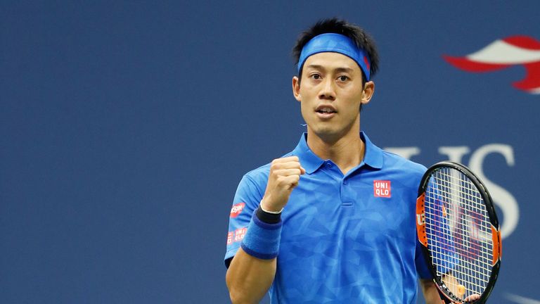 Kei Nishikori of Japan reacts against Andy Murray of Great Britain during their US Open semi-final