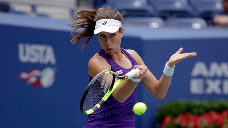 Johanna Konta returns a shot to Anastasija Sevastova of Lativa during US Open