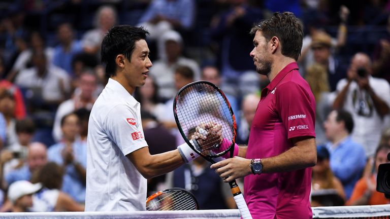 NEW YORK, NY - SEPTEMBER 09:  Stan Wawrinka (R) of Switzerland shakes hands with Kei Nishikori (L) of Japan after their Men's Singles Semifinal Match on Da