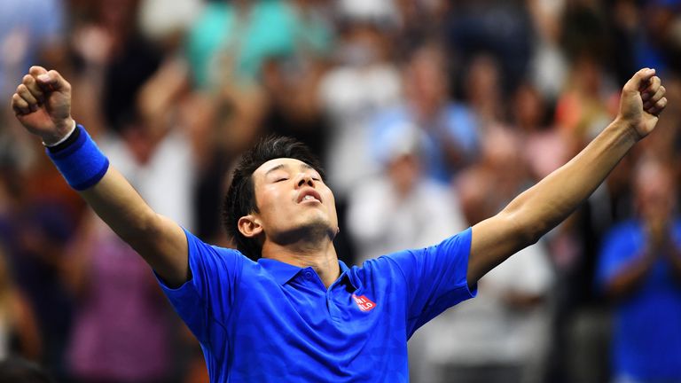 Kei Nishikori of Japan celebrates after defeating Andy Murray at the US Open