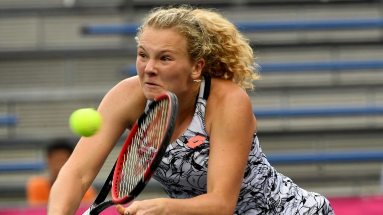 Katerina Siniakova of Czech Republic returns the ball towards Christina McHale of the US during their Japan Women's Open tennis singles final match in Toky