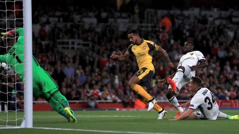 Arsenal's Theo Walcott scores his side's first goal of the game during the UEFA Champions League, Group A match v Basel at the Emirates Stadium
