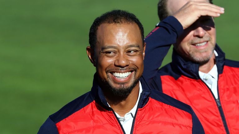 Tiger Woods of the United States looks on during team photocalls prior to the 2016 Ryder Cup at Hazeltine National 