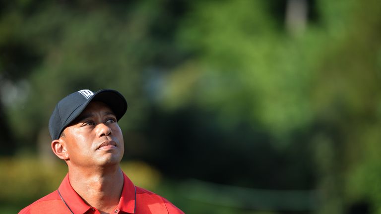 Tiger Woods looks on after the Quicken Loans National at Congressional Country Club in Bethesda, Maryland on June 26, 2016. / AFP / ANDREW CABALLERO-REYNOL