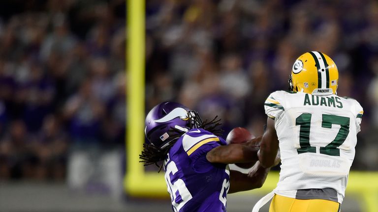 MINNEAPOLIS, MN - SEPTEMBER 18: Trae Waynes #26 of the Minnesota Vikings intercepts the the ball against Davante Adams #17 of the Green Bay Packers during 