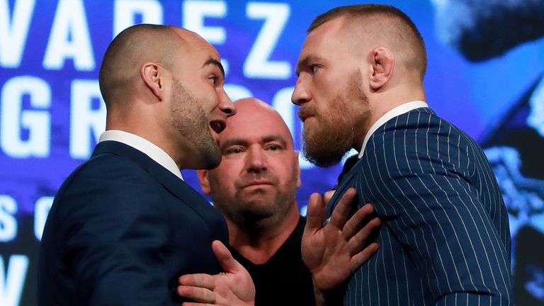 Conor McGregor and Eddie Alvarez face off as UFC president Dana White breaks them up at the UFC 205 press conference