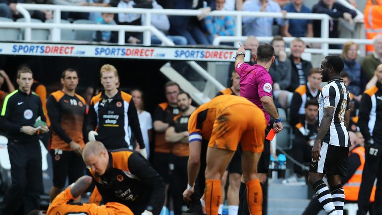 Newcastle United's Vurnon Anita (right) is sent off after a challenge on Wolves' Ricardo Ivan Cavaleiro (left)