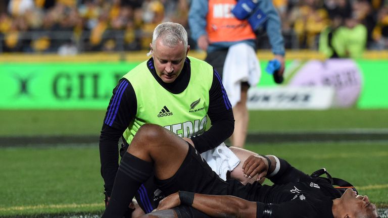 New Zealand winger Waisake Naholo reacts in pain after a successful try against Australia in Sydney, August 2016.