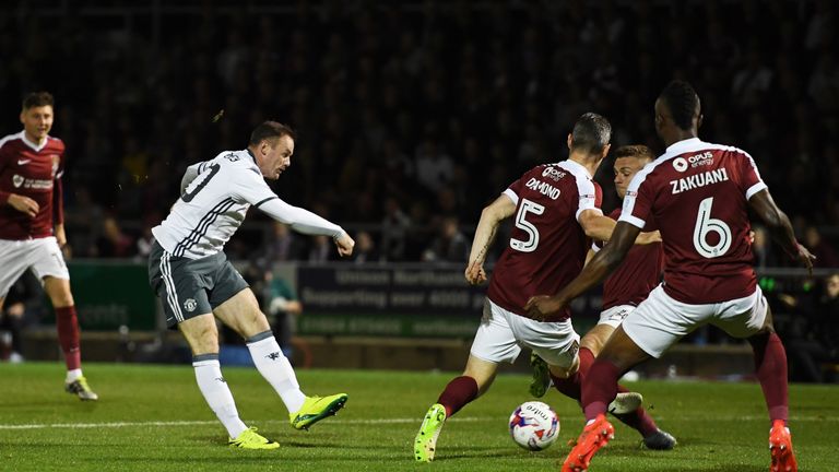 Manchester United's Wayne Rooney shoots on goal during the EFL Cup third round clash with Northampton Town at Sixfields