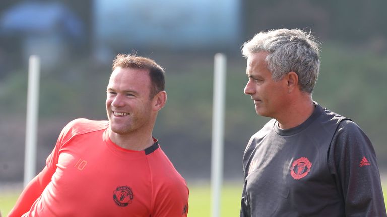 MANCHESTER, ENGLAND - SEPTEMBER 14:  Manchester United Manager Jose Mourinho and Wayne Rooney look on during a Manchester United training session at Aon Tr