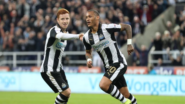 Newcastle United's Yoan Gouffran (right) celebrates scoring his side's second goal 