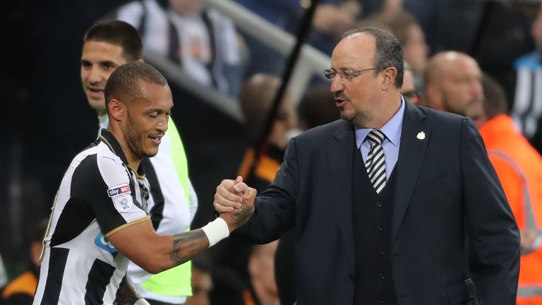 Newcastle United's Yoan Gouffran celebrates scoring his side's second goal of the game with manager Rafael Benitez during the EFL Cup, Third Round match at