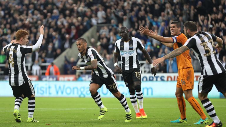 Newcastle United's Yoan Gouffran (second left) celebrates scoring his side's second goal of the game during the EFL Cup, Third Round match at St James' Par