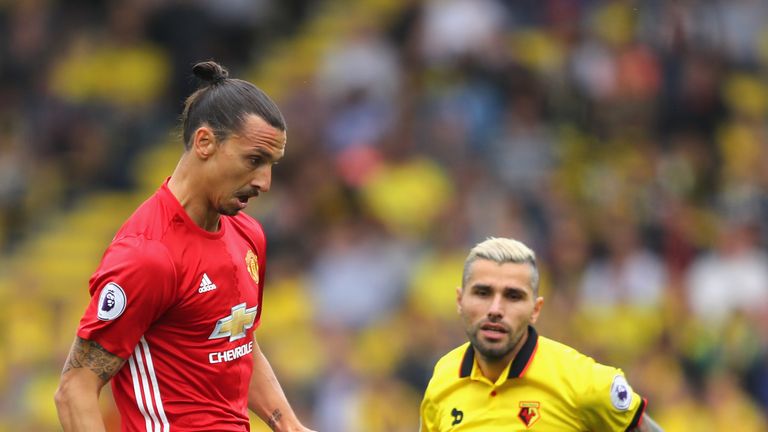 Zlatan Ibrahimovic of Manchester United controls the ball while Valon Behrami of Watford watches on
