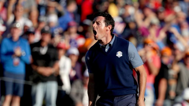 Rory McIlroy of Europe reacts on the 16th green after making a putt to win the match during afternoon fourballs