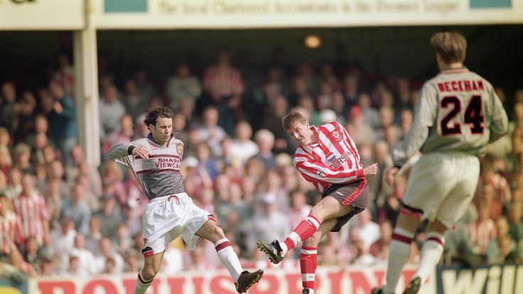 SOUTHAMPTON - APRIL 13 1996:  Matthew Le Tissier of Southampton shoots at goal as Ryan Giggs of Manchester United makes a challenge