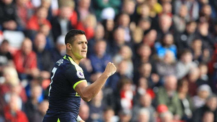 Arsenal striker Alexis Sanchez celebrates after opening the scoring at the Stadium of Light