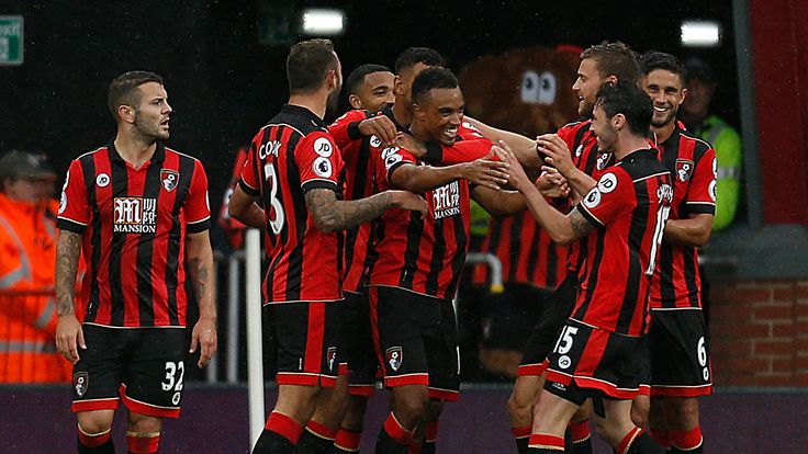Bournemouth's Junior Stanislas (centre) celebrates after scoring his side's fourth goal against Hull