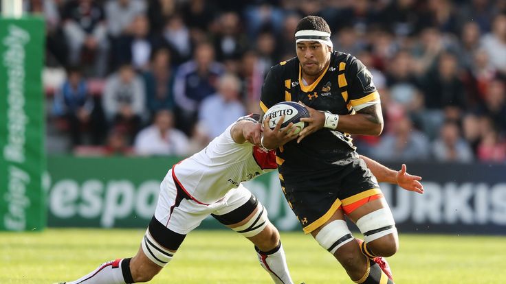 Nathan Hughes is tackled by Carl Axtens during the European Champions Cup