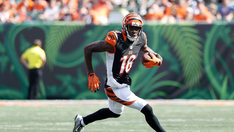 CINCINNATI, OH - SEPTEMBER 25:  A.J. Green #18 of the Cincinnati Bengals carries the ball during the fourth quarter of the game against the Denver Broncos 