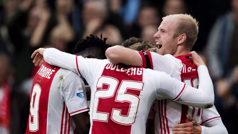 Ajax's players celebrate a goal during the Dutch Eredivise football match between Ajax Amsterdam and FC Utrecht at The Amsterdam ArenA in Amsterdam on Octo