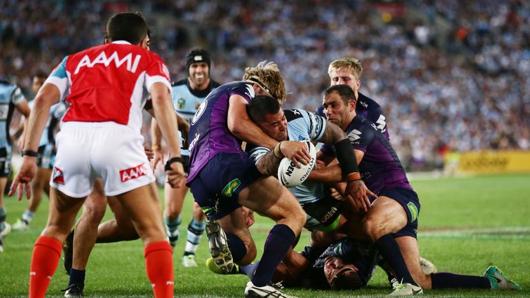 Andrew Fifita of the Sharks takes on the defence before scoring a try during the 2016 NRL Grand Final