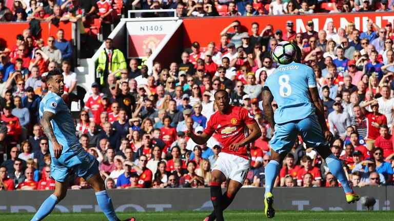 Anthony Martial of Manchester United scores his sides first goal during the Premier League match between Manchester Unite