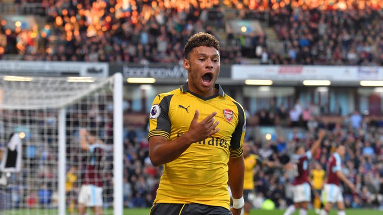 Alex Oxlade-Chamberlain celebrates Arsenal's match winning goal at Turf Moor