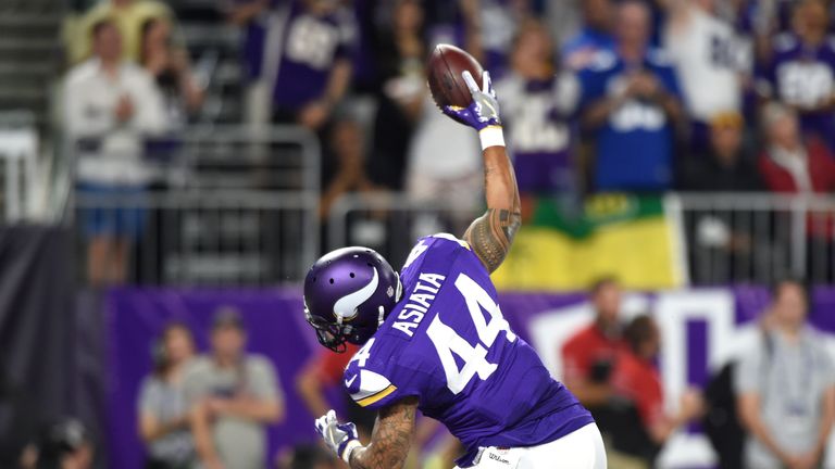 MINNEAPOLIS, MN - OCTOBER 3: Matt Asiata #44 of the Minnesota Vikings celebrates a touchdown in the first quarter of the game against the New York Giants o