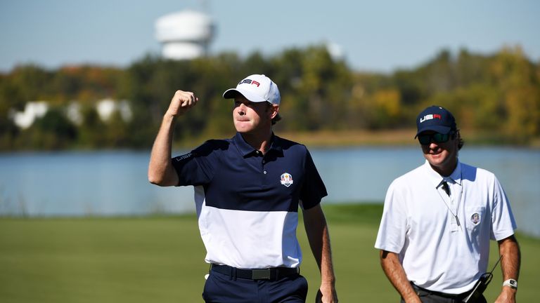 CHASKA, MN - OCTOBER 02:  Brandt Snedeker of the United States reacts on the seventh green with vice-captain Bubba Watson during singles matches of the 201