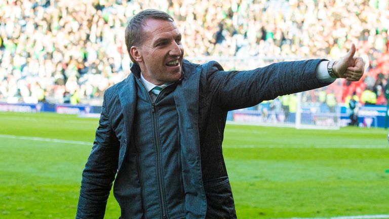 Celtic manager Brendan Rodgers celebrates with fans at full-time