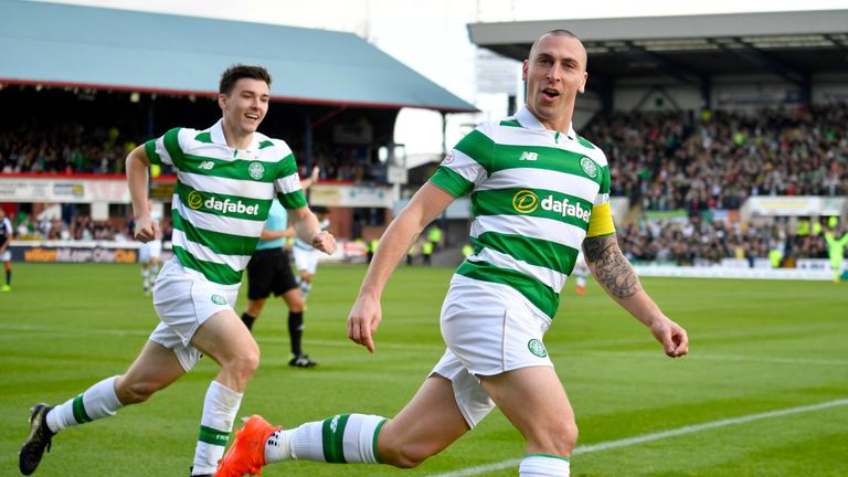 Scott Brown celebrates after scoring the opening goal at Dundee