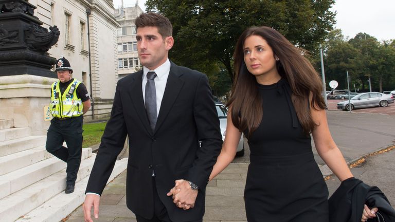 CARDIFF, WALES - OCTOBER 04:  Chesterfield F.C football player Ched Evans arrives at Cardiff Crown Court with partner Natasha Massey to stand trial for rap